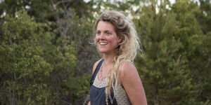 Image of Sanne in a forest.