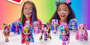 Image of a group of girls looking at dolls.