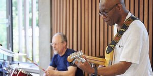 Jazz band drummer and guitarist