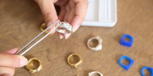 Image of someone holding a ring.
