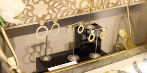 Image of a set of earrings on display.