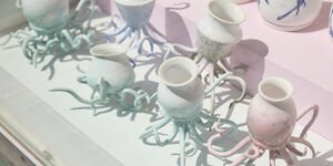 Image of vases in a window display.