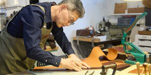 Image of John working in his studio.