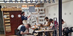 An image of an evening shoemaking class in the Carreducker studio.