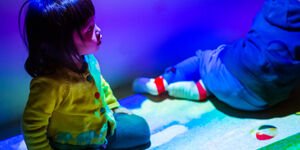 Image of a child playing in a sensory room.