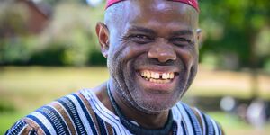 Image of a man smiling.