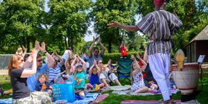 Image of a man performing to a crowd.