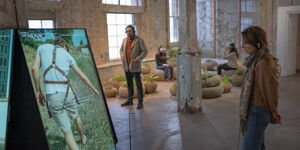 Image of someone looking at an art display.