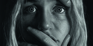 Black and white painting of a woman covering her mouth by Emma Towers.