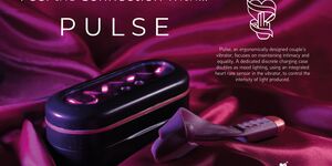 Image of an art piece surrounded by purple velvet.