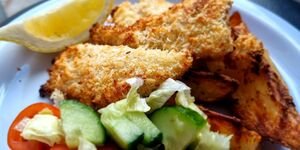 Image of Homemade Fish Fingers with Potato Wedges and Salad.