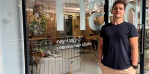 Image of Ricky standing outside his studio.