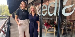 Image of Claire and Paris on outside the studio.