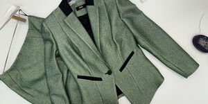 Image of a green blazer and dress.