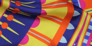 Close up shot of a yellow scarf.