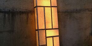 Image of a glowing ceramic lamp.