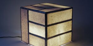Image of a lit up ceramic cube.