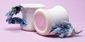 An image of two of Rose's cups with tentacle handles.