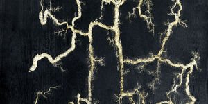 Painting of a gold tree on a black background.