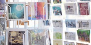 Photograph of a selection of colourful cards in a rack