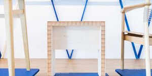 Image of a wood design in a gallery.