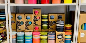 Image of a shelf of candles.