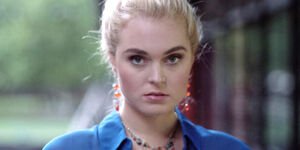 An image of a model wearing Catherine's earrings and necklace.