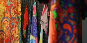 Image of row of colourful scarves.