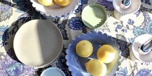 A spread of blue and green ceramic plates.