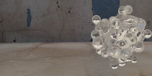 A picture of one of the graduate's art pieces. It shows a floating translucent bubble.