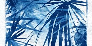 Artwork of blue palm trees.