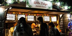 Image of people ordering food from an Asian food stall.