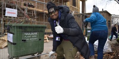 Students from Roots and Shoots College Kennington helping renovate the parterre garden at St John’s.