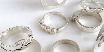 A set of silver rings by The Ringsmiths.