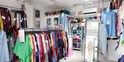 Image of Joanne Plumb Knitwear's shop displaying her knitwear.