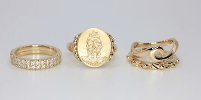 Image of a set of three gold rings.