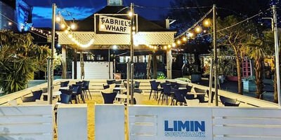 Image of the seating area of Limin at night time.
