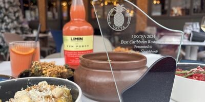 Image of Limin's award on a plate of food.